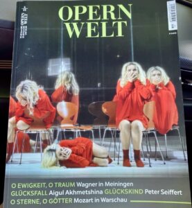 Opernwelt magazine cover featuring performers in red.